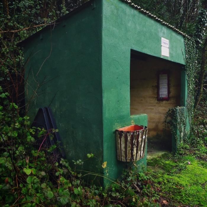 Old green bus shelter