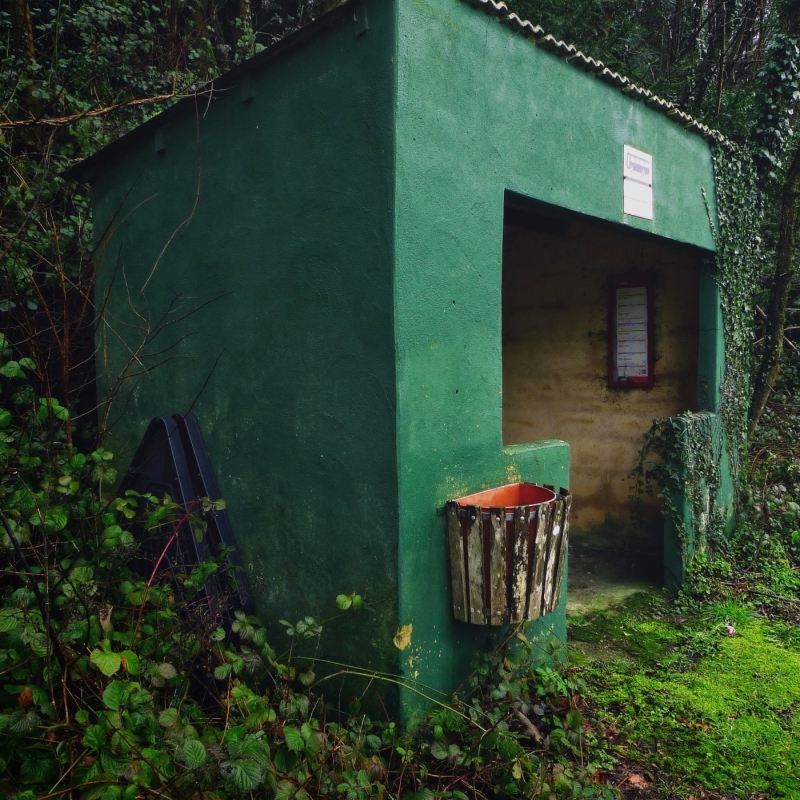 Old green bus shelter