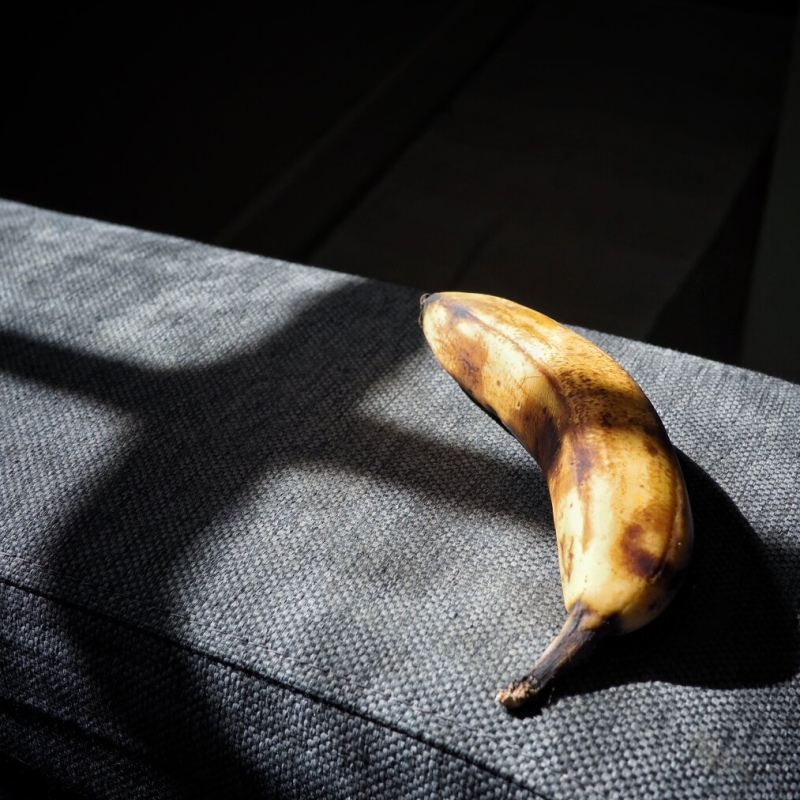 Sunlight, shadows and a banana that will soon be eaten.