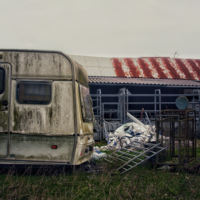 Abandoned Caravan and farm sheds