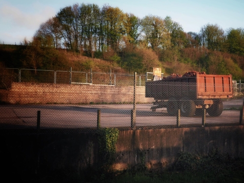 Evening sunlight hitting the brick trailer.